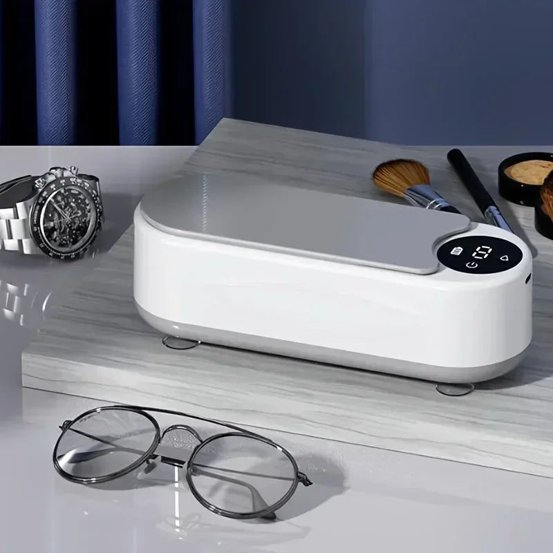 Shiny Box - Limpiador ultrasónico portátil para gafas, joyas y relojes. Bateria larga duración.